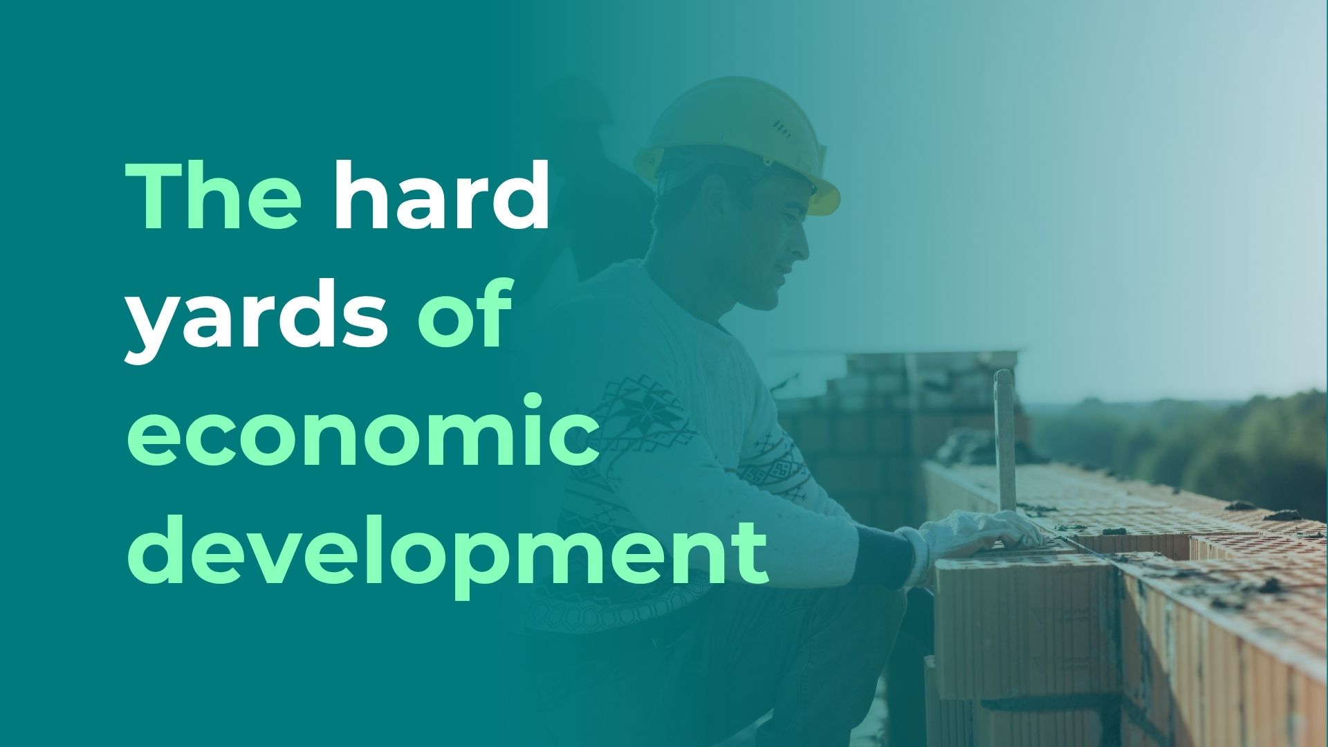 builders on site laying bricks